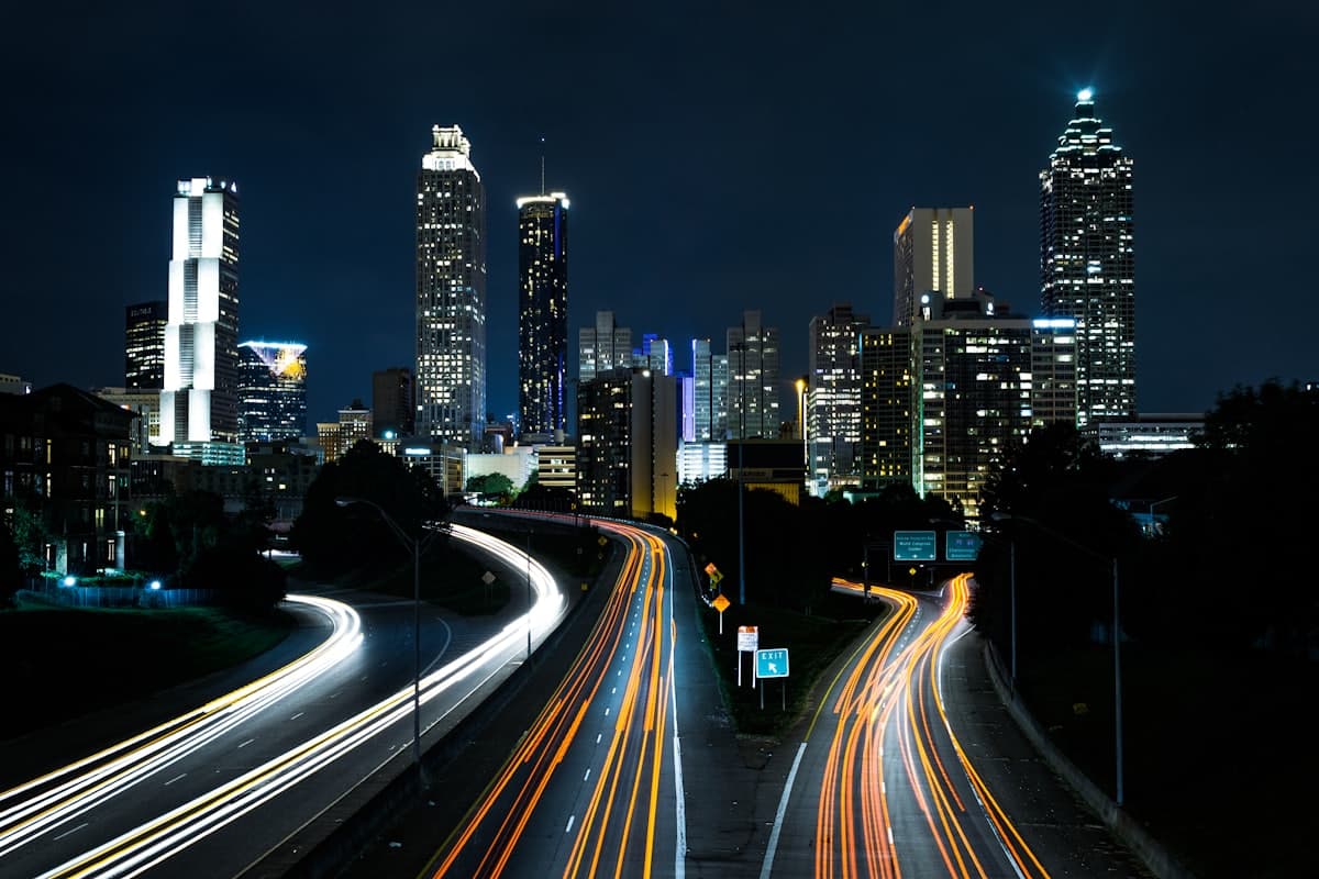 Evening traffic light trails on a Dallas highway, representing personal injury claims